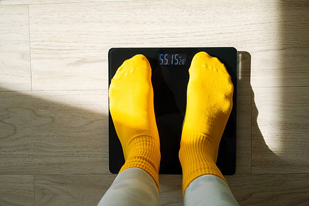 Person using smart scale